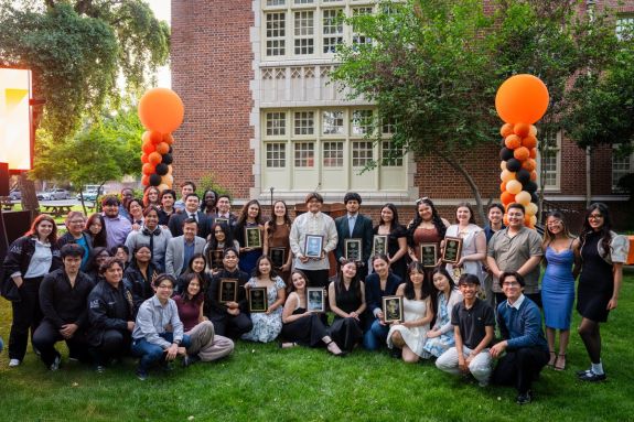 student awardees posing with their awards
